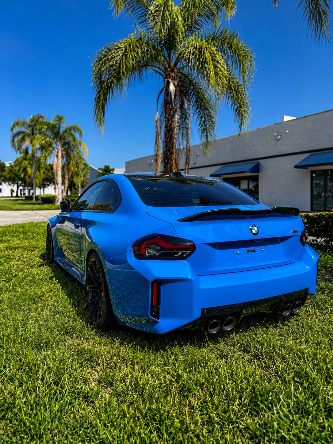 BMW M2 outside the shop